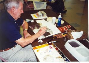 Landon Woody is shown in 1998 doing what  he loved - painting. He died on Aug. 24.
