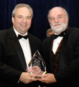 Barter Theatre was recently awarded The Torchbearer Award for the top small business in Virginia. Accepting the award from Virginia Lt. Governor Bill Bolling, left, is Richard Rose, Barter Theatre's Producing Artistic Director.