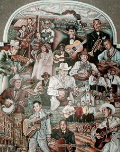 "All in the Family" depicts the ties between country music and African-Americans. The mural in the Sherrod Library at East Tennessee State University in Johnson City is modeled on original artwork by Willard Gayhart and inspired by musician Jack Tottle.