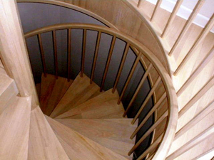 This spiral staircase by Robert Sproll demonstrates his proficiency in the engineering of hand-bent wood. "My goal on this project was to create the lightest-looking modern spiral staircase possible, yet equal in strength to a heavily-constructed spiral wood staircase."