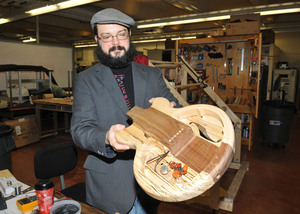 Lecturer Garth Ghearing creating a semi-hollow bodied guitar. 