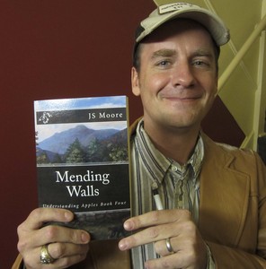 J.S. Moore has written a series of books called "Understanding Apples," as well as a couple of children's books. Among his latest is "Mending Walls." UJoe Tennis/Bristol Herald Courier)