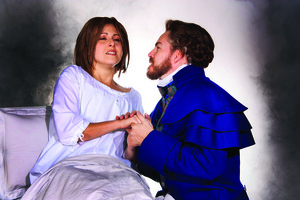 Hannah Ingram (Fantine) with Pat McRoberts (Valjean) in a scene from "Les Mis."