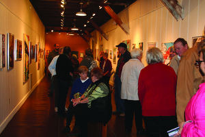 A crowd gathers at the Arts Depot in Abingdon, Va., during a recent art walk.