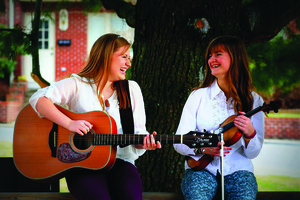 Mischief in the Meadow is composed of Rebekah Blair (guitar) and Alli Boling (fiddle).