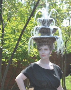 Melissa Theide models Marcia Willard's "Three-Tier Fountain" wig.