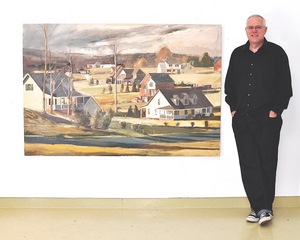 Charles Goolsby poses with one of his landscapes.