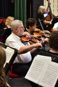 The Heart of Appalachia Community Orchestra practices before a June concert. (photo by David Grace)