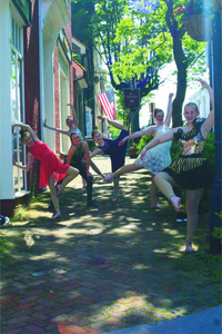 From left to right: Sophie Aloisio, Madison Cummins, Devon Coe, Avery Thomas, Katie Belle Crosswhite and Nora Okes pose on the street in Abingdon, Virginia.