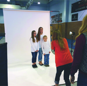 King University photography students use their talents to benefit families for the holidays.