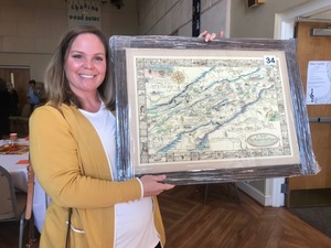 Katy Threash purchased this map by Clarence Kearfott at the silent auction. The map was framed by Carl B. Jessee. (Photo by Kathy Black)
