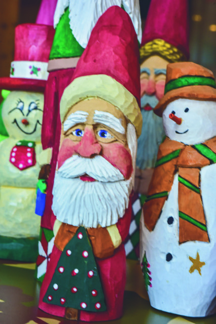 Maurice Vanhook is well known for his carved Santa Clauses.