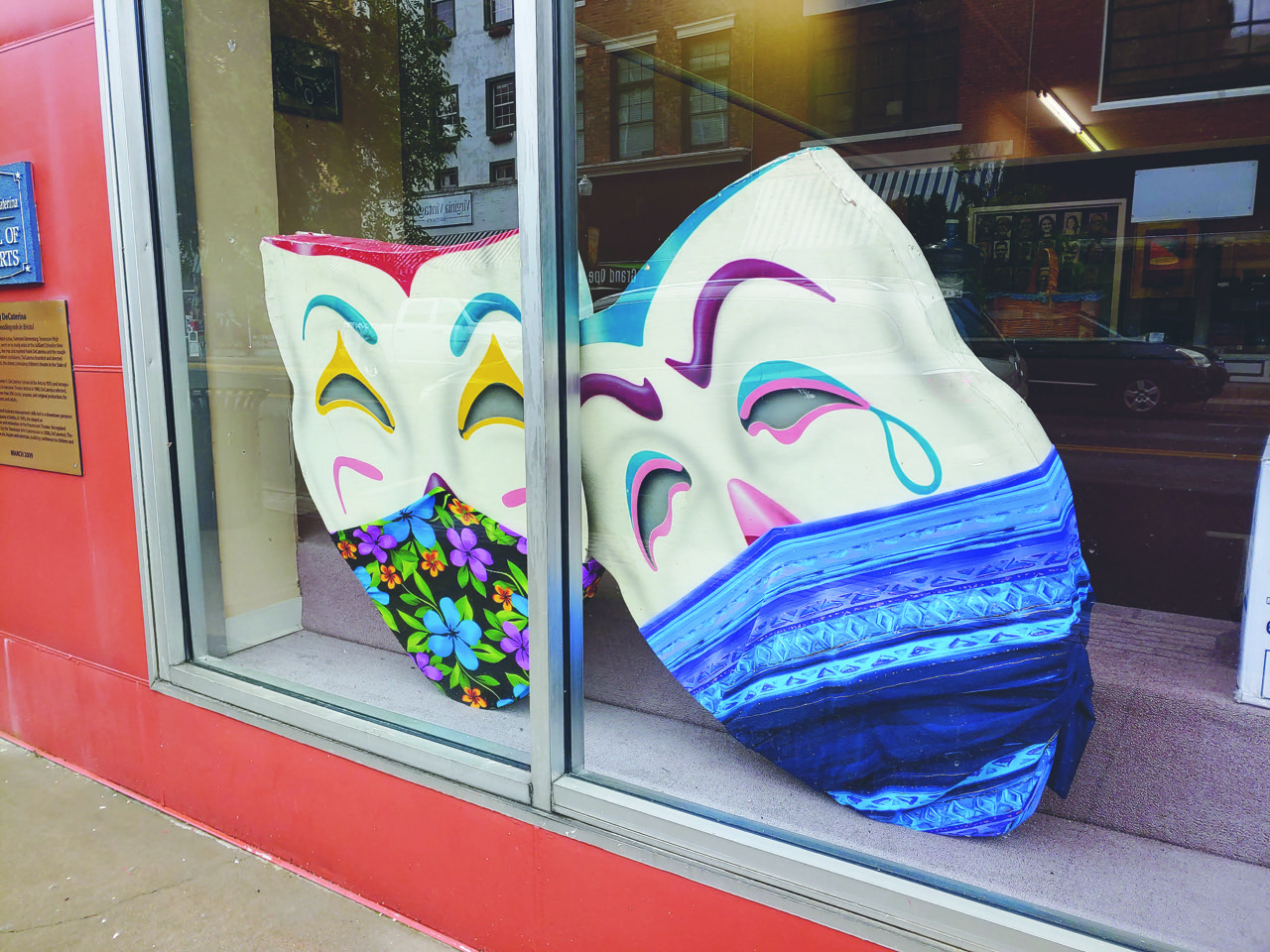 Socially-responsible masks adorn the windows at Theatre Bristol.