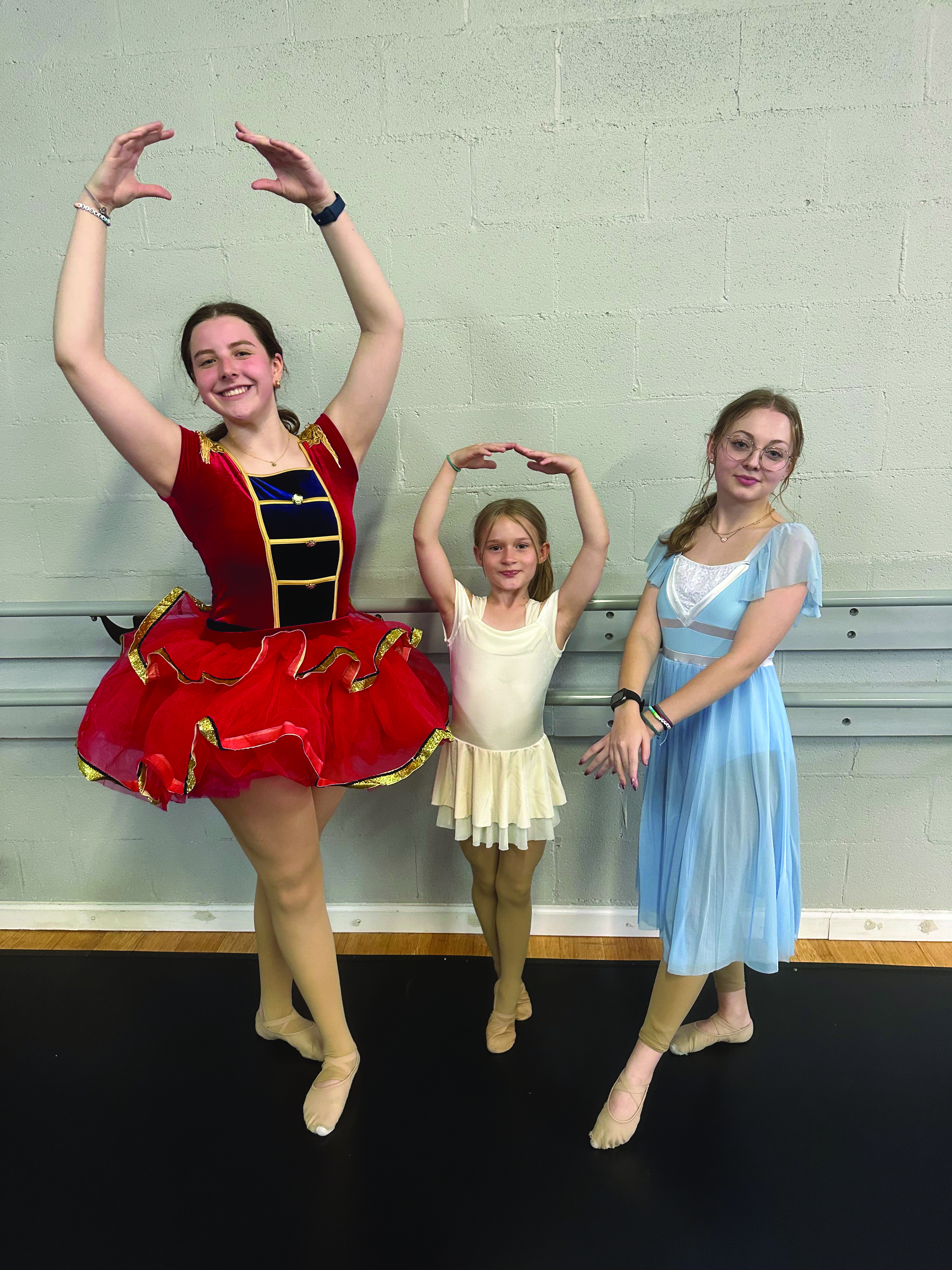 From left to right: Nutcracker (Sadie Asbury), Snowflake (Abigail Ratliff), Clara (Laklynn Burden)