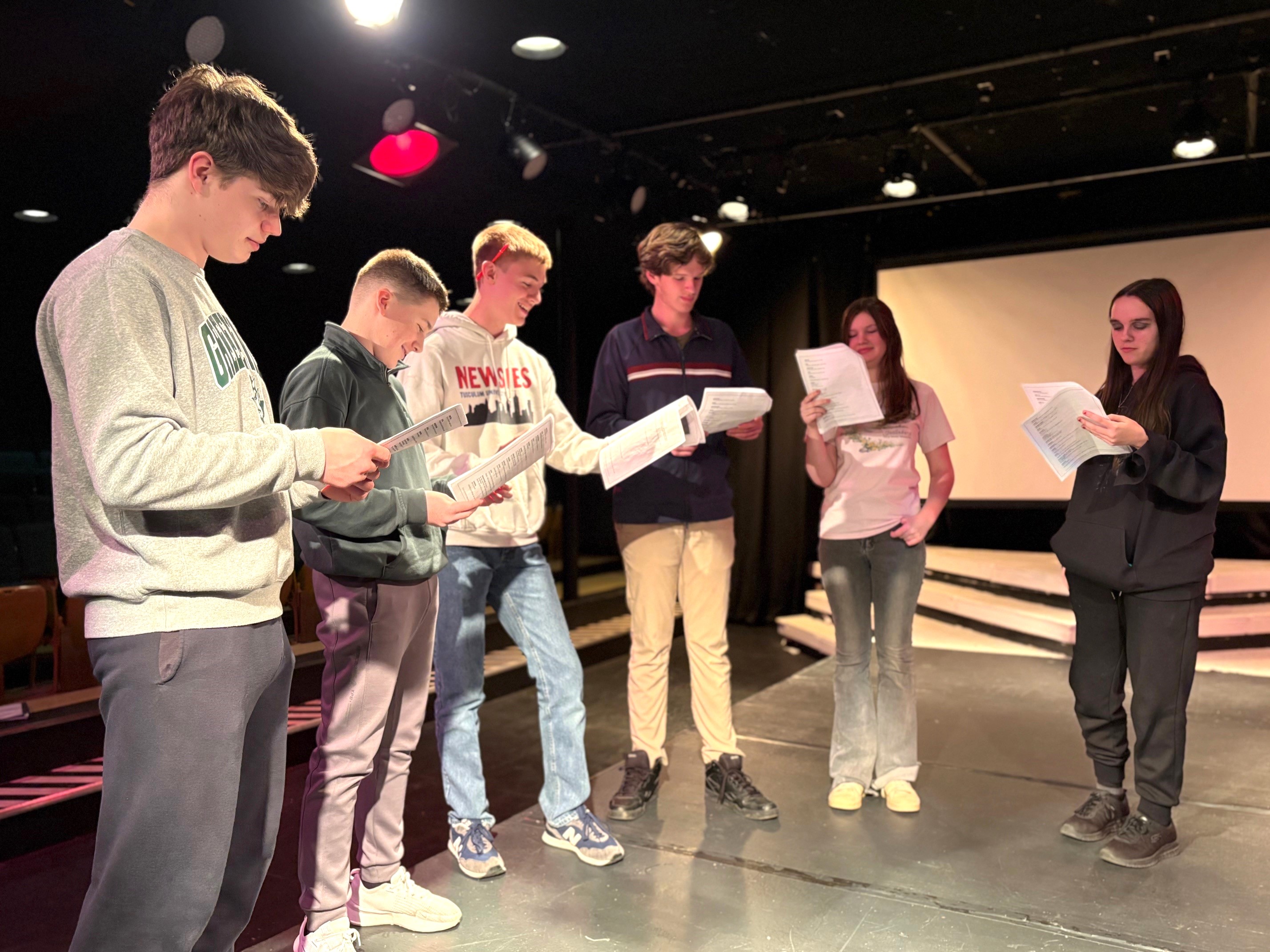 Actors rehearse a scene for the showcase.