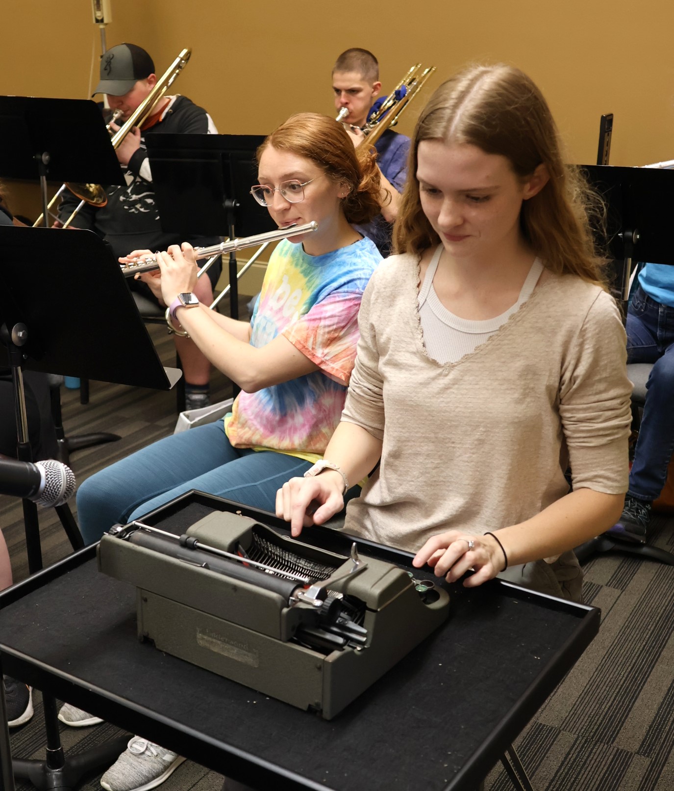 Isabella Headland plays the typewriter during a song by that name.
