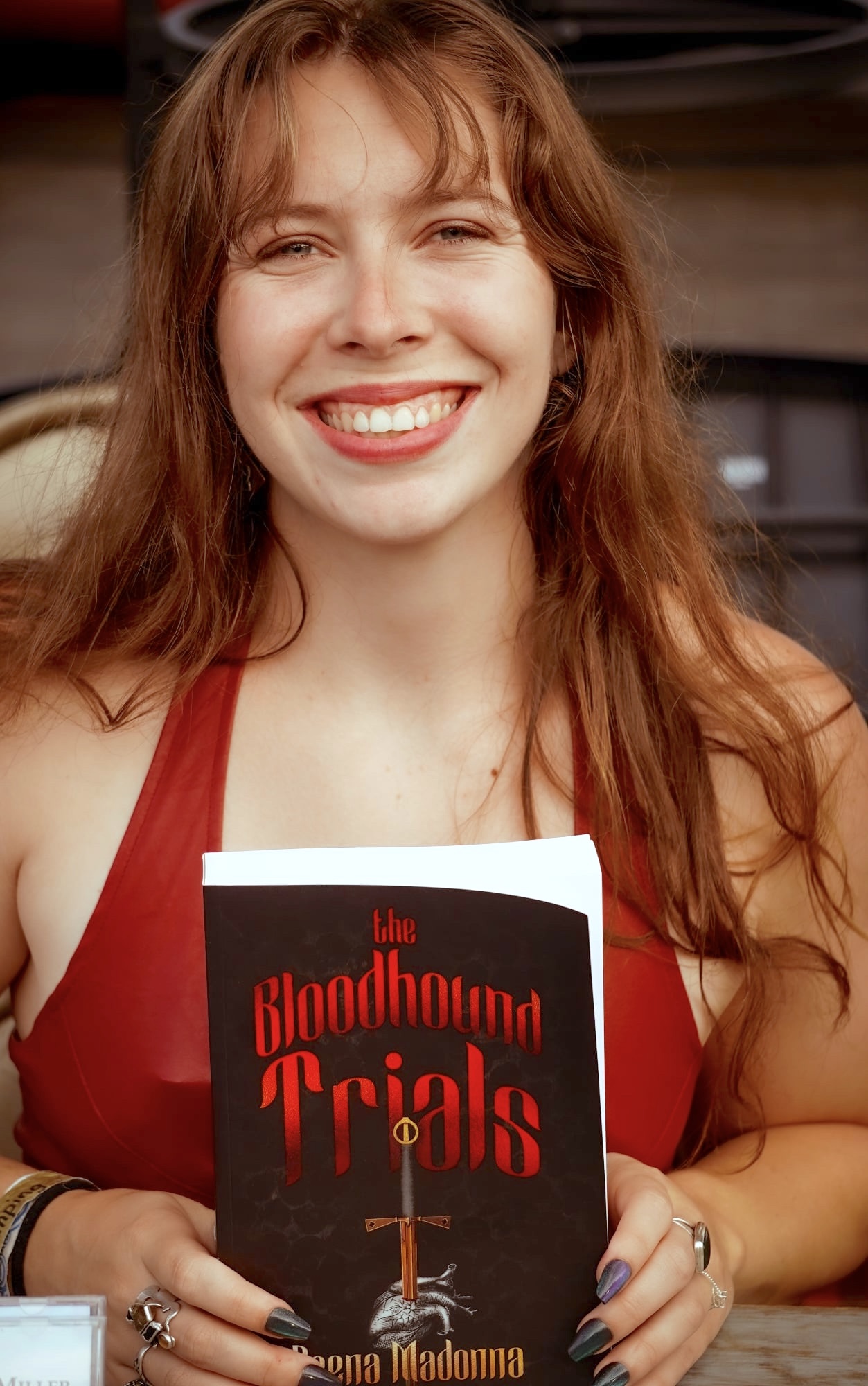 Local author Deena Madonna with her book 'The Bloodhound Trials'